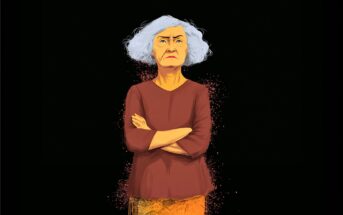 Digital illustration of an older woman with white hair, wearing a long-sleeved brown shirt, standing with arms crossed and a serious expression against a black background with orange particles around her lower half.
