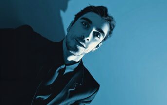 A digital illustration of a man in a suit and tie, gazing slightly upward, with dramatic blue and black shading and a minimalist background.