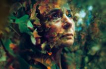 A woman’s thoughtful face is blended with autumn leaves and foliage, creating a dreamy, surreal effect as she gazes upward in a forest-like environment.