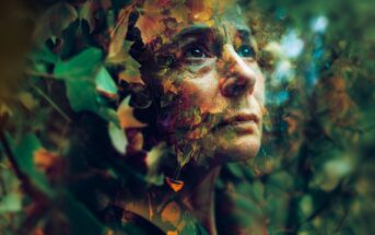 A woman’s thoughtful face is blended with autumn leaves and foliage, creating a dreamy, surreal effect as she gazes upward in a forest-like environment.