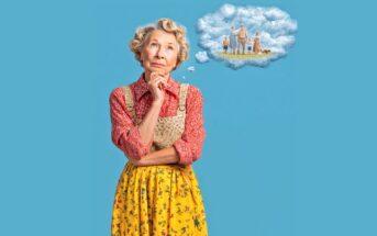 An older woman in a colorful apron and yellow floral skirt stands thoughtfully with her hand on her chin, while a cloud-shaped thought bubble above her shows a family standing together.