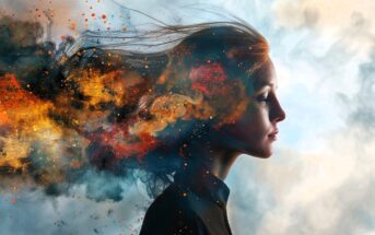 A woman in profile stands against a soft, cloudy background. Her hair blends into a vibrant explosion of colorful powder and smoke, creating an abstract and dynamic effect that merges seamlessly with the environment.