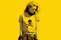 A moody illustration of a young woman with wavy hair, wearing a t-shirt featuring a skull and crossbones graphic, stands against a solid yellow background.
