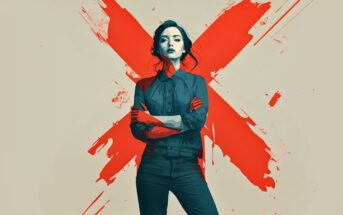 A woman stands confidently with arms crossed in front of a large, bold red X painted on a neutral background. The image features strong contrast and stylized, artistic brushstrokes.