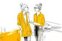 Illustration of two women with glasses and hair in buns, wearing yellow tops, standing and talking by a counter with a coffee cup and book, against a white background with yellow accents.