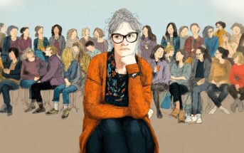An older woman with gray hair and glasses sits pensively in the foreground, surrounded by a diverse crowd of people engaged in conversation in the background. She wears an orange cardigan and rests her chin on her hand.