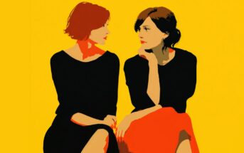 Two women in black dresses sit facing each other against a bright yellow background. One woman has short red hair, the other has dark hair tied back. They appear to be having a thoughtful conversation.