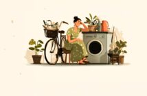 A woman in a green dress sits on a chair next to a washing machine, looking tired. Around her are a bicycle with a basket, several potted plants, and a kettle on the washing machine.
