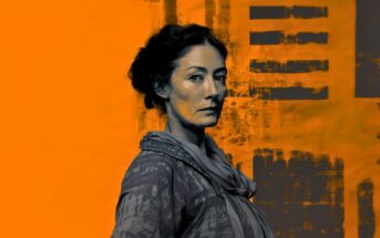 A woman with tied-back dark hair and a serious expression stands against an abstract orange and black painted background, wearing a patterned top and scarf.