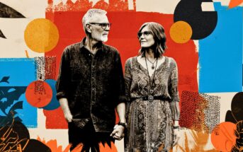 An older couple holding hands and smiling at each other stands against a colorful abstract background with bold patterns and shapes.