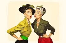 Two women dressed in vintage 1950s-style clothing and hats pose playfully, standing close with exaggerated facial expressions and lips puckered, as if gossiping or surprised.