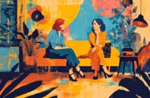 Two women sit on a yellow sofa in a vibrant, colorful room with abstract patterns and plants, engaged in conversation. One has red hair and wears blue, the other has blue hair and wears orange. The scene is warm and artistic.