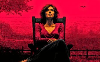 A woman with short hair sits in a wooden chair outdoors, looking upwards. The background is a vivid red with faint tree silhouettes, a fence, and a bird in the sky, creating a dramatic and moody atmosphere.
