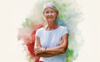 An older woman with white hair stands confidently with arms crossed, wearing a white top and red skirt, set against a watercolor-style background of red, green, and beige hues.