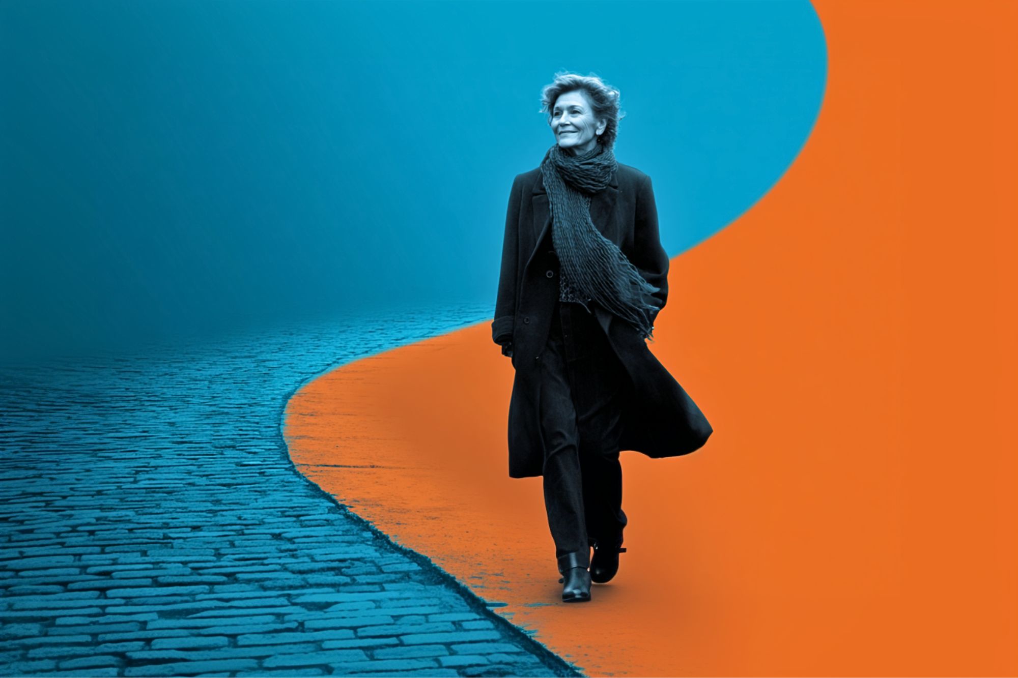 A person in dark clothing walks confidently where a cobblestone path meets a bright orange abstract area, with a blue background creating a striking contrast.