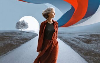 A woman with gray hair in a rust-colored dress walking along a road toward a large sun and a stylized red and blue ribbon.
