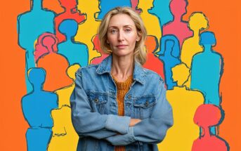 A woman with blond hair, wearing a denim jacket and orange sweater, stands with arms crossed. Behind her is a colorful, abstract background featuring outlines of people in blue, yellow, and orange.