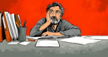 Illustration of a bearded man sitting at a cluttered desk, resting his head on his hand and looking up thoughtfully. The background is bright red and there are scattered papers, folders, and stationery on the desk.