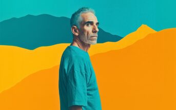 A man with short gray hair and a beard stands in profile, wearing a teal shirt against a vibrant, stylized background of yellow and blue mountains.