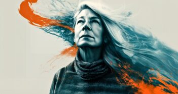 A mature woman gazes upward with determination, her long hair blending into dynamic, abstract orange and blue paint strokes that sweep across the image, creating a sense of energy and movement against a light background.