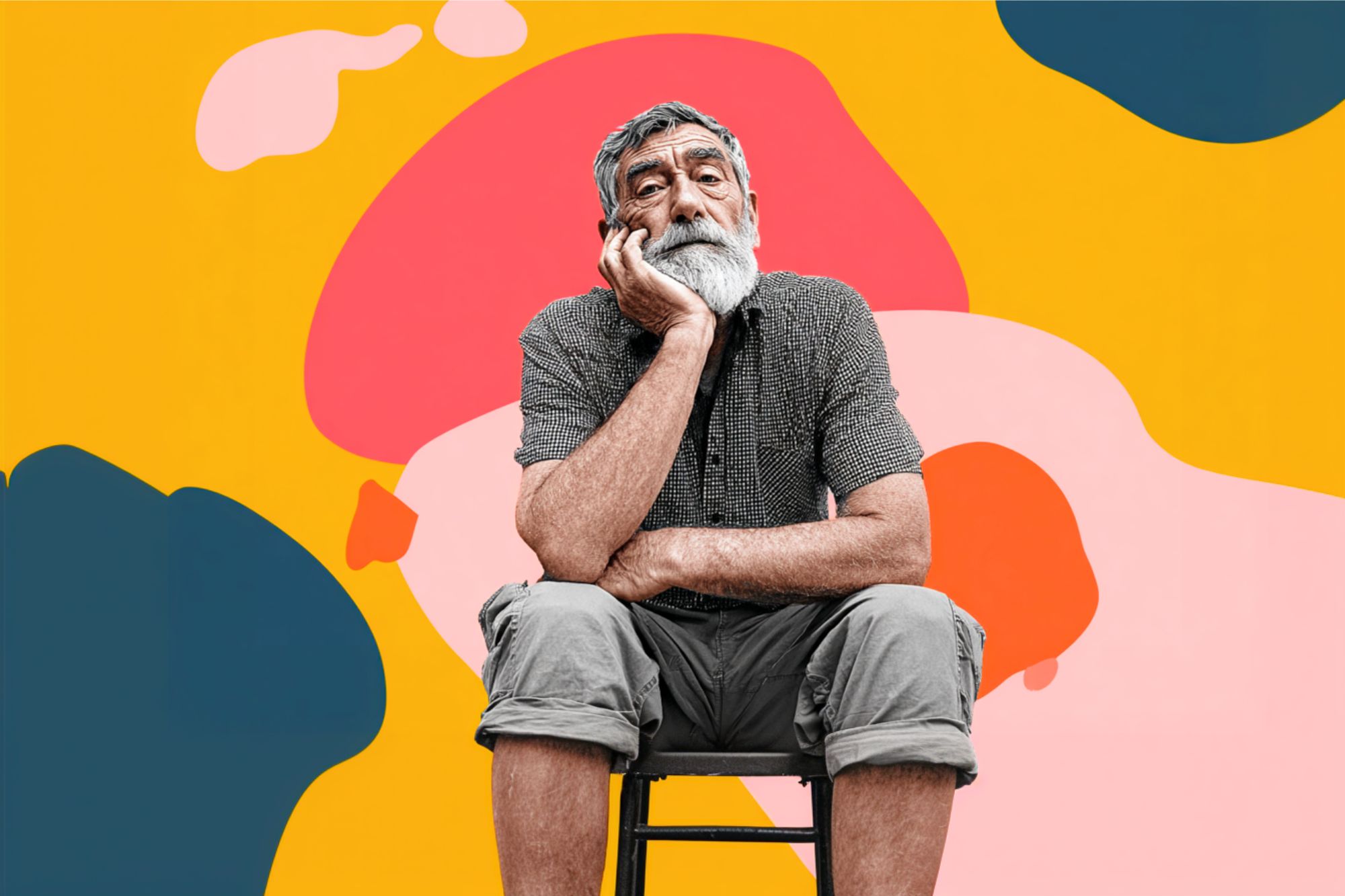 An older man with a white beard sits on a stool, resting his chin on his hand, looking thoughtful. He is in front of a vibrant yellow background with abstract pink, orange, and blue shapes.