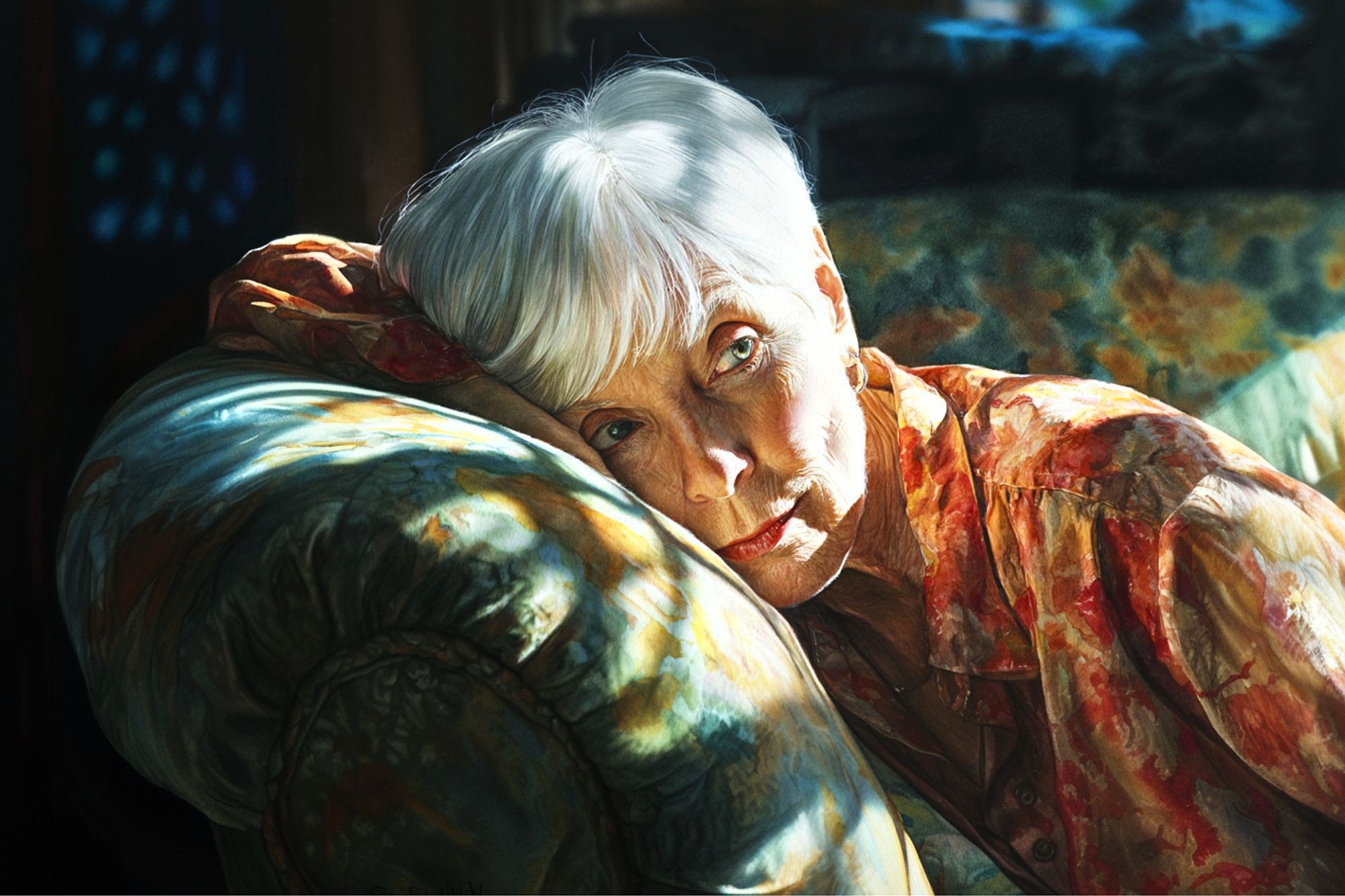 An elderly woman with short white hair rests her head on the arm of a patterned sofa, gazing thoughtfully ahead. She wears a colorful, floral blouse and is illuminated by soft, dappled sunlight.