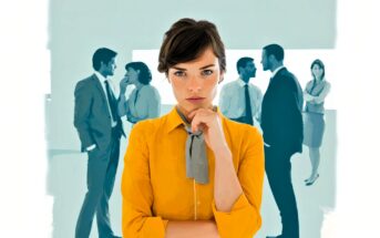 A woman in a yellow shirt stands in the foreground, looking thoughtfully at the camera, while two groups of people in business attire converse in the blurred background.