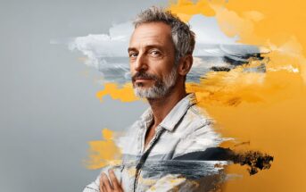 A middle-aged man with gray hair and beard stands with folded arms, wearing a light denim shirt. Artistic brushstrokes in yellow, black and white blend the background and foreground, creating a dynamic, creative effect.
