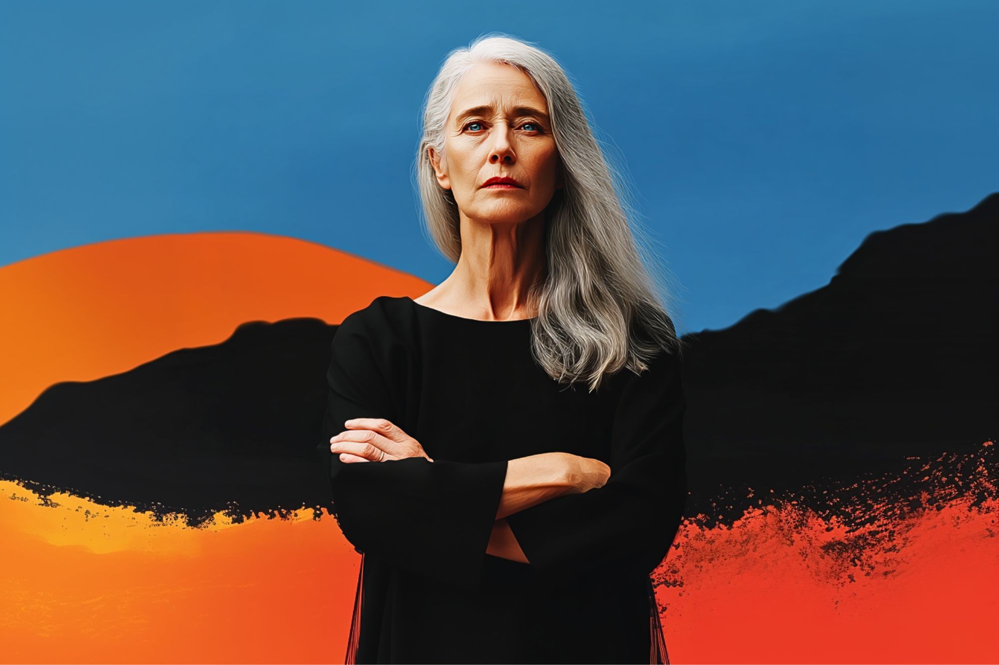 A woman with long gray hair and a serious expression stands with arms crossed, wearing a black top, in front of a vibrant blue, orange, and black abstract background.