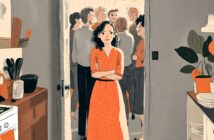 A woman in a red polka-dot dress stands in a kitchen doorway with arms crossed, looking uncertain, while a group of people socializes in the background. The kitchen is cozy with plants and dishes visible.
