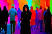 A woman in black stands alone with her arms crossed, looking down, while colorful, blurred figures of people pass by in the vibrant, abstract background.