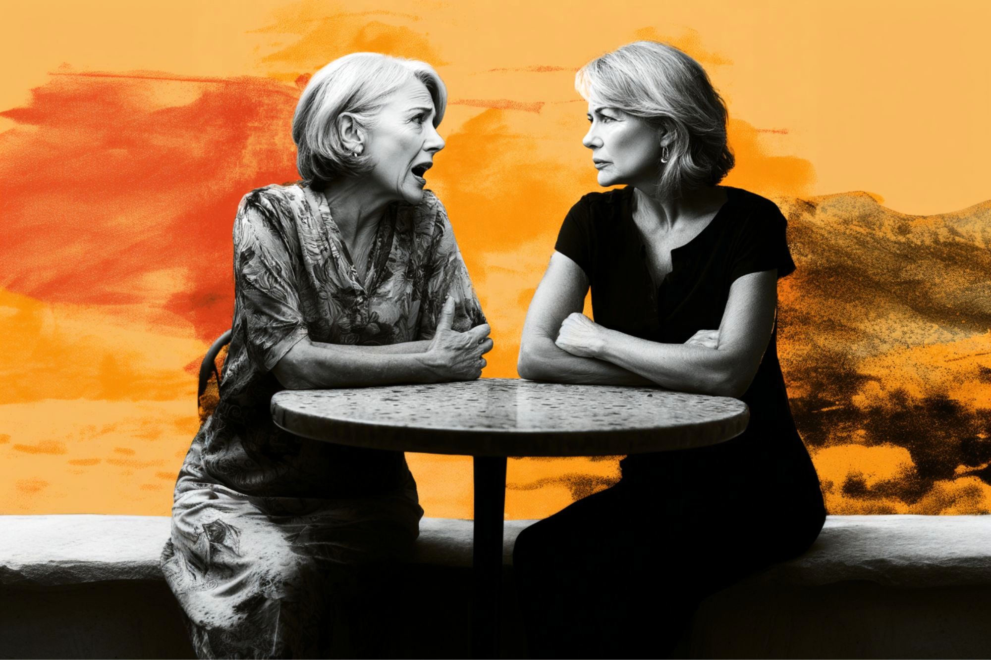 Two women sit across from each other at a round table, one animatedly talking while the other listens with arms crossed. The background is a vibrant mix of orange and yellow tones.