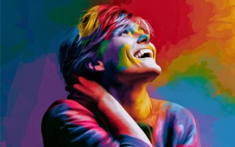 A person with short hair laughs joyfully, looking upward. The image uses vibrant, multicolored paint effects, blending shades of red, yellow, blue, and green across the background and the person’s face, hair, and clothing.