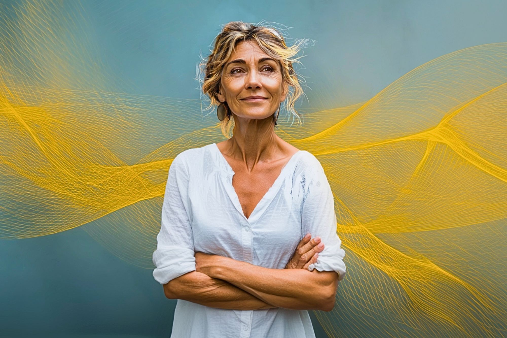 A woman with light brown hair in a loose white shirt stands with arms crossed, looking thoughtfully to the side. The background is blue with swirling yellow abstract lines.