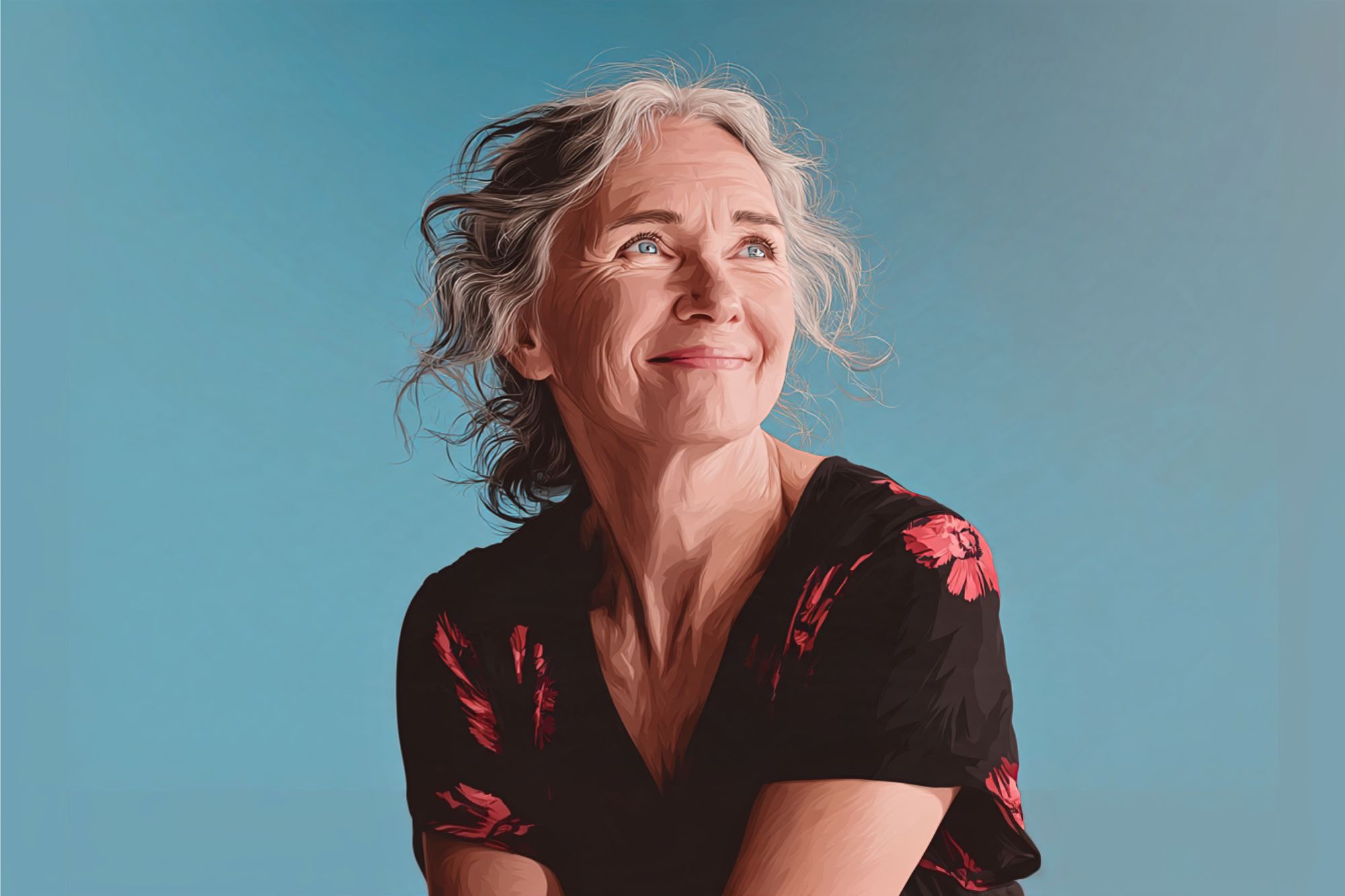 A smiling older woman with gray hair and a black shirt with red flowers looks upward against a plain blue background.