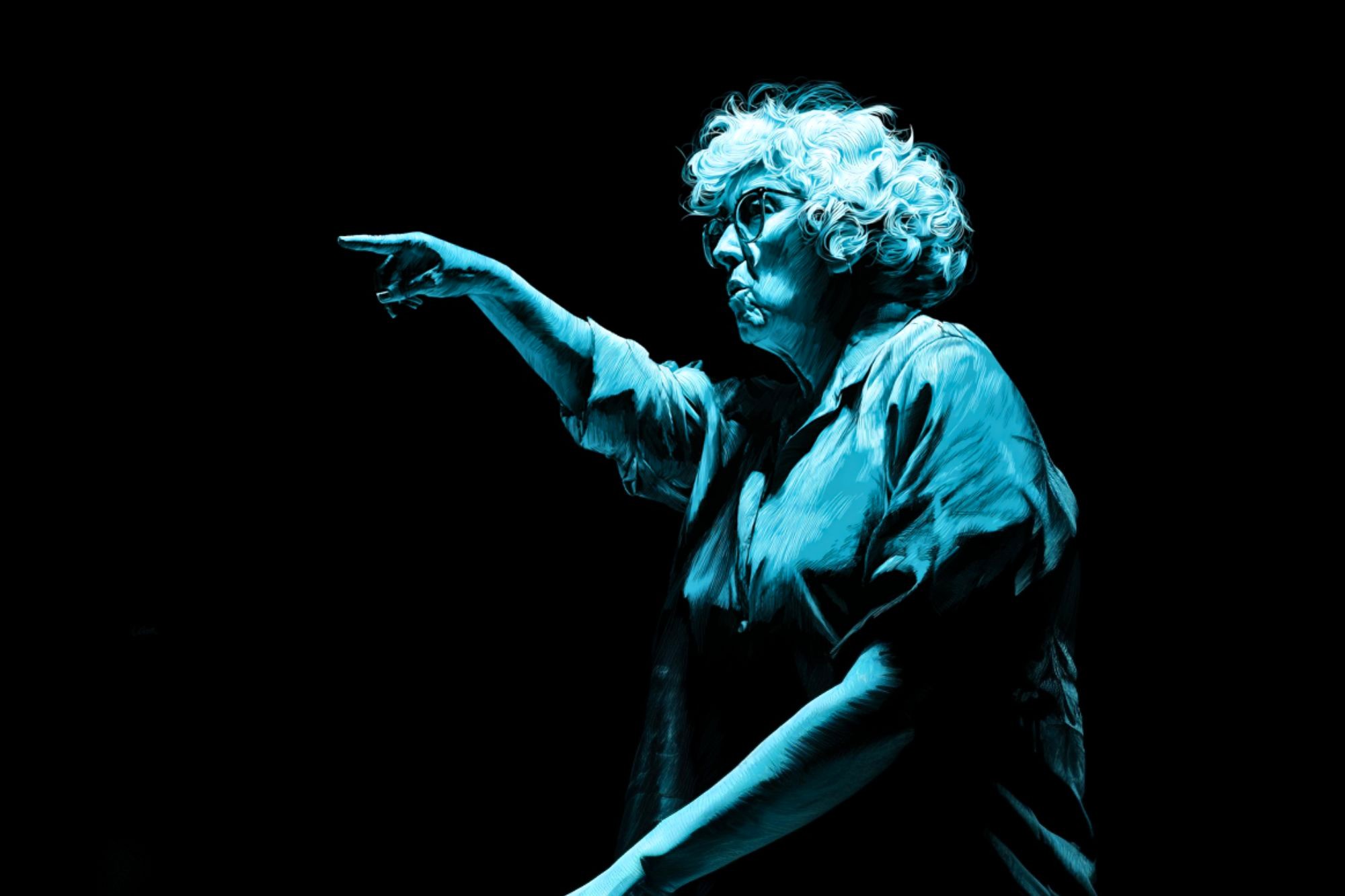 An older person with curly white hair, wearing glasses and a loose shirt, is dramatically pointing forward. The lighting creates a blue tone, highlighting their focused expression against a dark background.