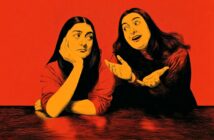 Illustration of two women with long hair, both wearing red, seated at a table. One looks bored with her head resting on her hand, while the other gestures animatedly, talking enthusiastically. Background is solid red.
