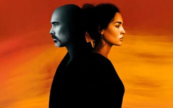 A man and woman stand back-to-back against a warm gradient background, with the man’s side in cool tones and the woman’s side in warm tones, symbolizing contrast or duality.