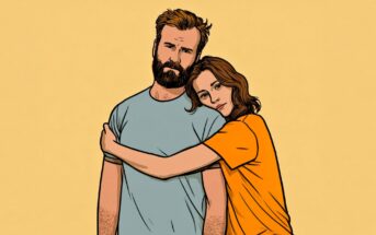 A woman in an orange shirt hugs a man in a light blue shirt from the side. The man looks serious while the woman rests her head on his shoulder. The background is a plain light yellow.